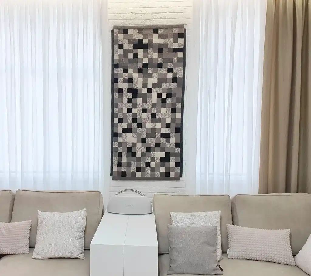 handwoven wool wall hanging textile art piece.