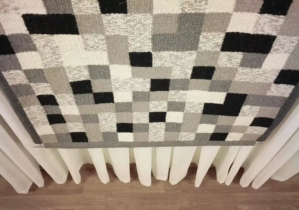 handwoven wool wall hanging textile art piece.
