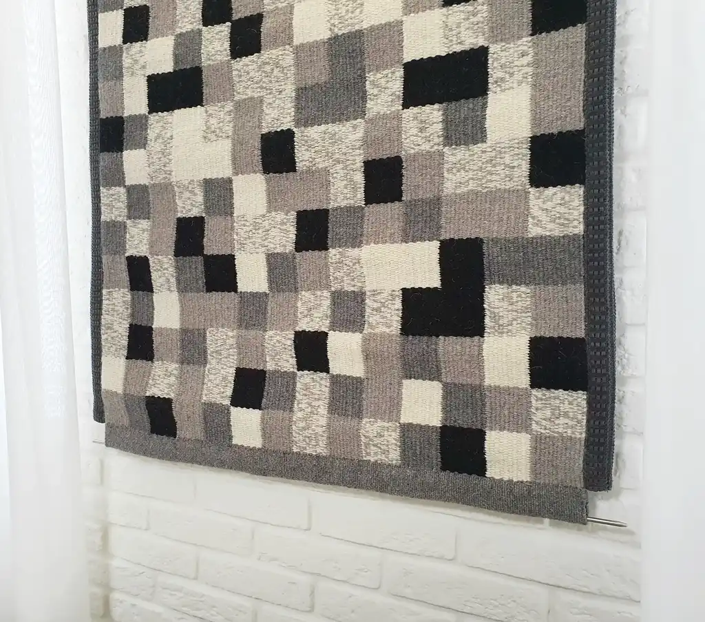 handwoven wool wall hanging textile art piece.