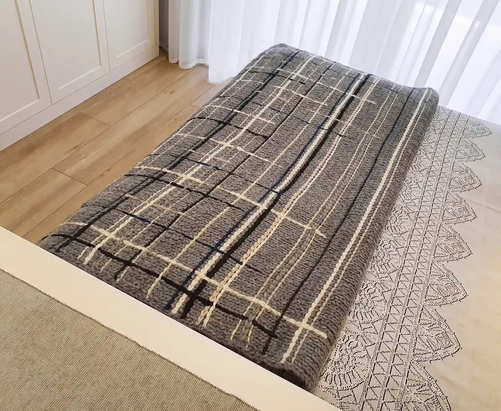 luxury knitted throw made from merino wool.