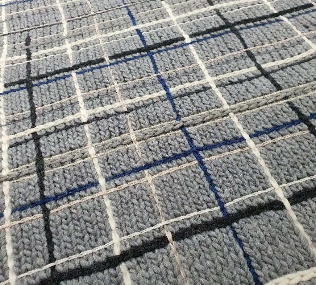 luxury knitted throw made from merino wool.