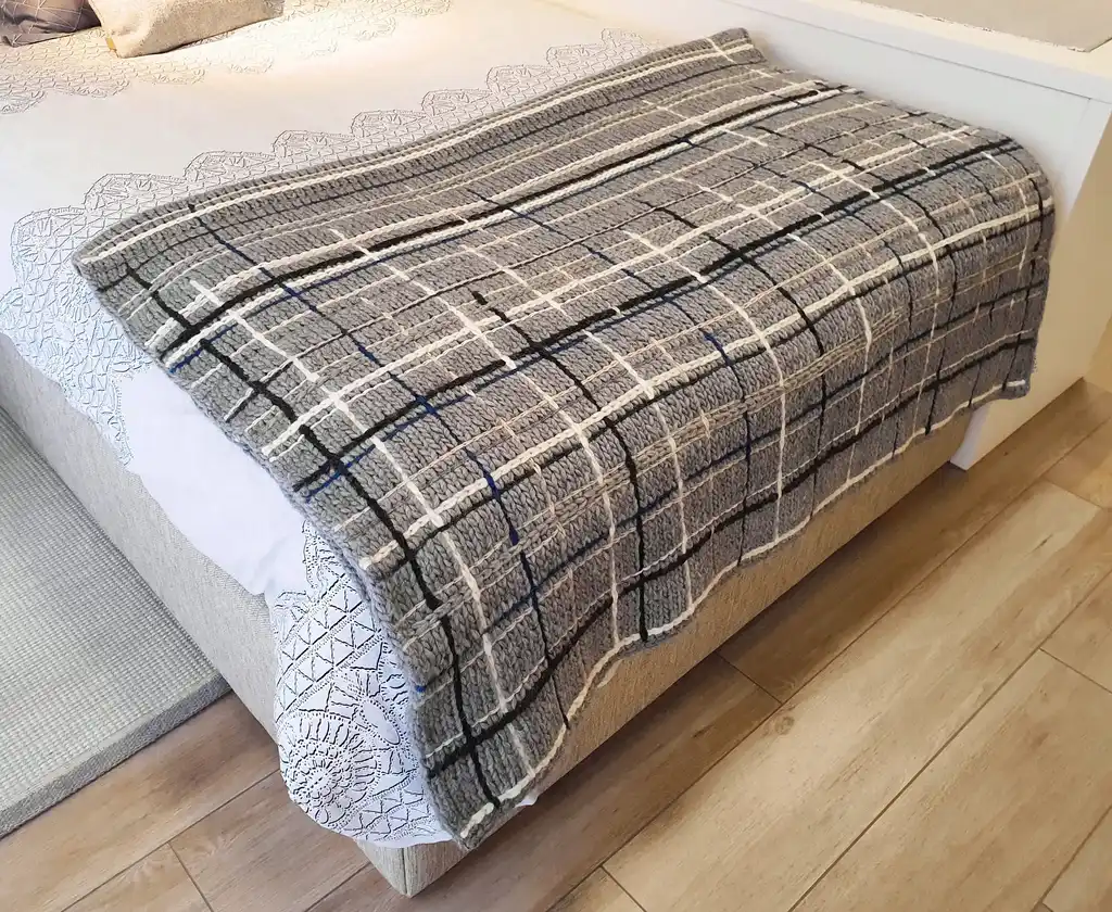 luxury knitted throw made from merino wool.
