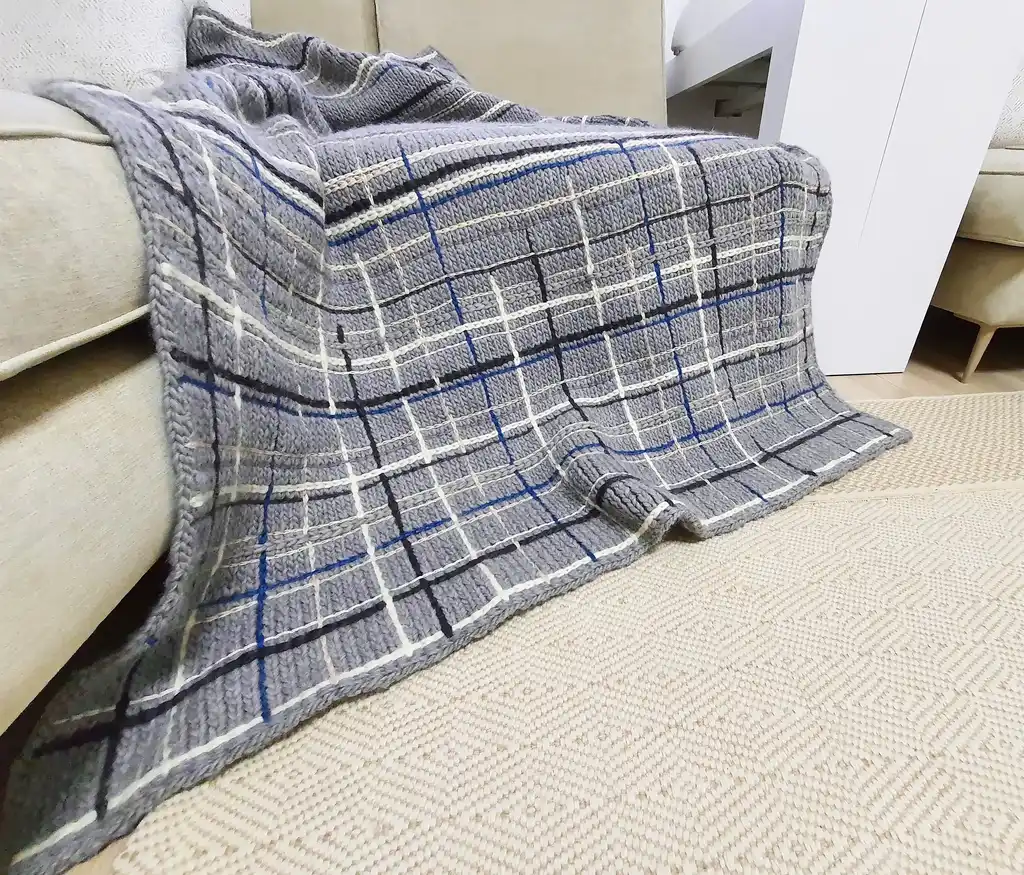 luxury knitted throw made from merino wool.