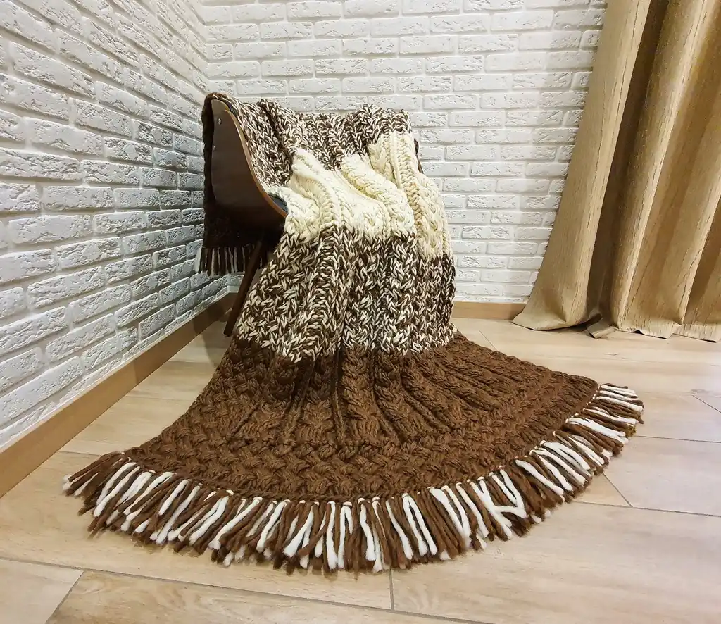 luxury merino wool knitted throw blanket in elegant design.